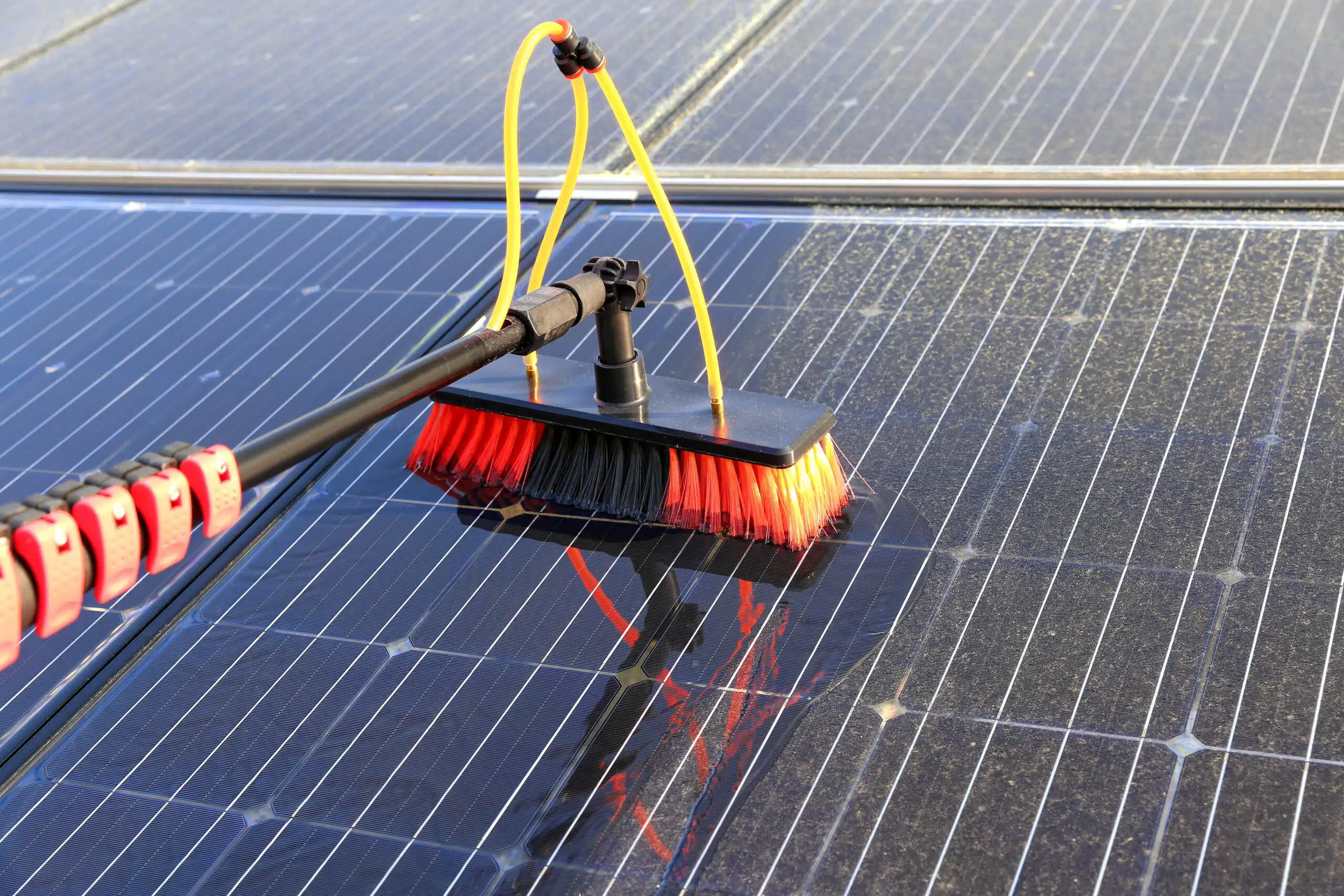 Gentle,Cleaning,Of,Solar,Modules,With,Water clean solar panels without a ladder safely